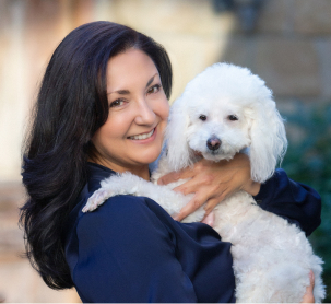 Dr Michelle Torres and Casper the office dog